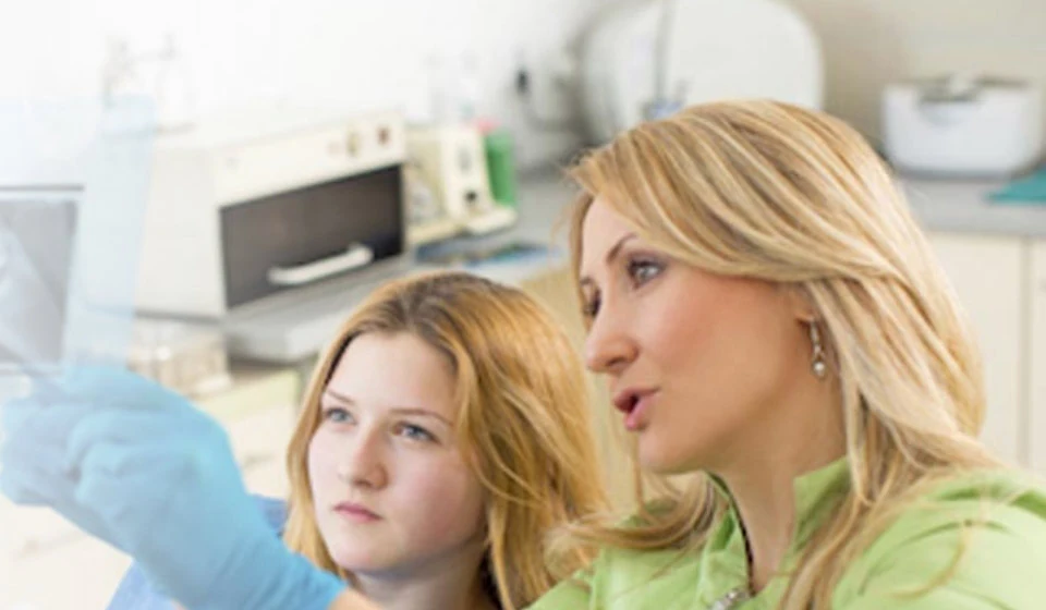 patient having her dental x-rays reviewed at Eastside Modern Dentistry in Issaquah, WA